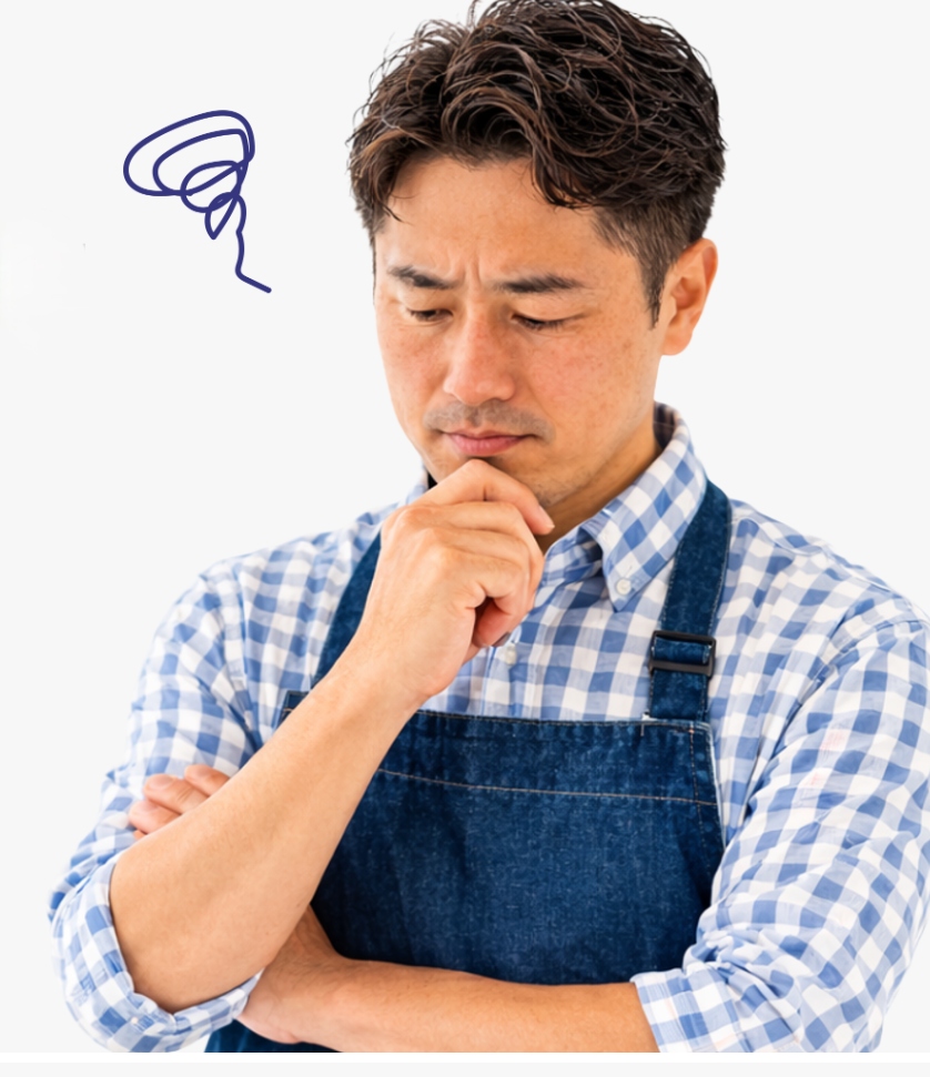 悩む直売所の男性